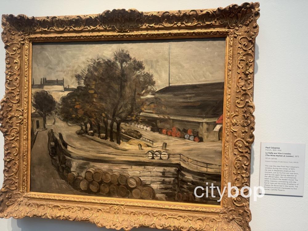 La Halle Aux Vins (1872) by Cezanne.